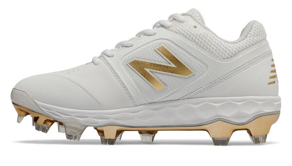 gold and white new balance cleats